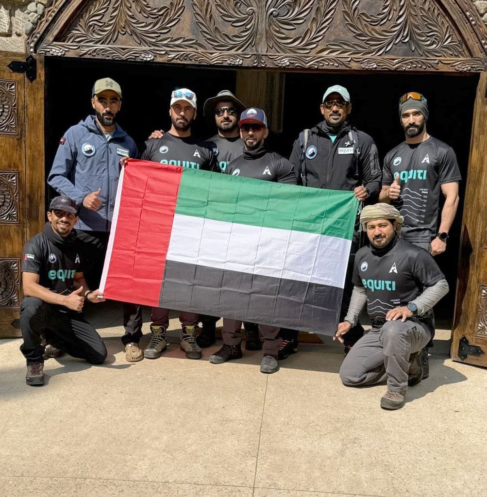 Emirati youth raise their country's flag at the top of Kilimanjaro, the highest in Africa