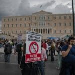 A general strike paralyzes Athens. Greek workers revolt against extended working hours.
