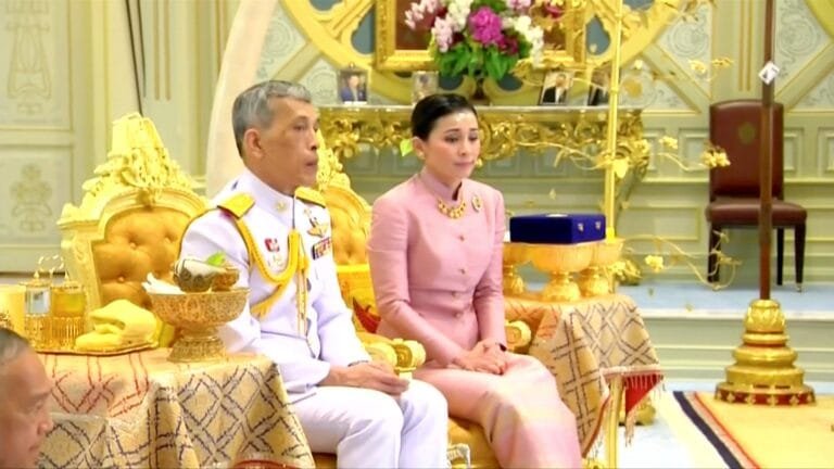 The Queen of Thailand is crowned with a gold medal at the Southeast Asian Games.