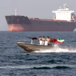 Iranian armed boats approach a US oil tanker in the Strait of Hormuz and order it to stop